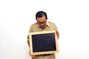 Wow and amazed expression of Indonesian government employees while presenting blank black board