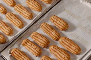 fresh baked eclairs, concept for bakery or patisserie