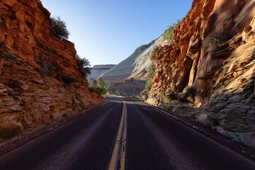 Scenic Road in American Mountain Landscape. Sunny Morning Sunrise Sky. Zion National Park, Utah, United States of America. Adventure Travel