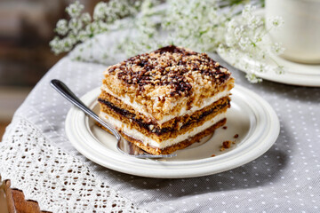 Homemade honey layer cake on the table.