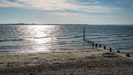 Fototapeta premium Glowing sea at west Wittering beach