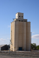 Old grain bin silos holding commodity crops and grains