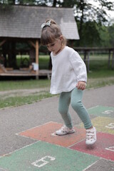 little child playing in the park in romania sibiu 