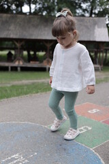 little child playing in the park in romania sibiu 