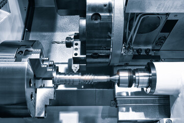 Manufacturing CNC professional lathe machine. Industrial concept.
