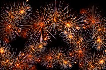 Fototapeta premium Abstract background, bright explosions fireworks black background.