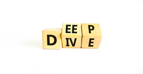 Deep dive symbol. Concept words Deep dive on wooden cubes. Beautiful white table white background. Deep dive and business concept. Copy space.