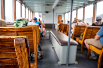focus on wooden bench on a tour boat in Glacier National Park, Montana, USA