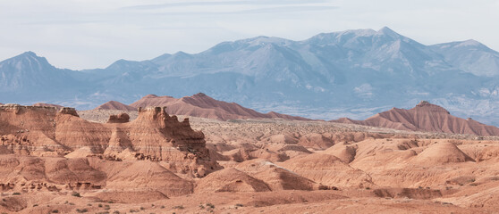 Red Rock Formations and Hoodoos in the Desert at Sunrise. Spring Season. Goblin Valley State Park. Utah, United States. Nature Background.