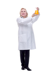 Young female scientist working with liquids in laboratory