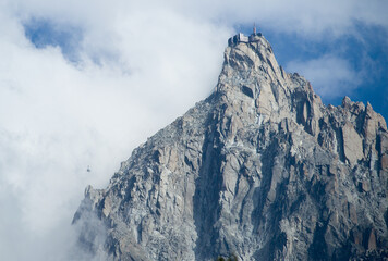 Aiguille du Midi and cable car emerging from the fog