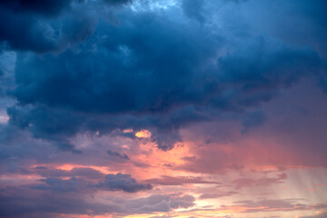 Naklejka na ściany i meble stormy clouds on sky, twilight sky