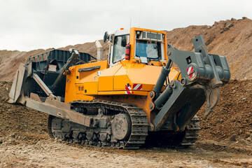 Obraz premium Track-type bulldozer. Earth-moving equipment.