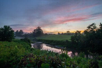 Vermont summer sunset over a creek