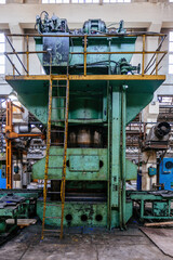 Fototapeta na wymiar Hydraulic press in the factory workshop