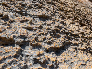 abrasions on limestone cliffs and surface changes and patterns in stones