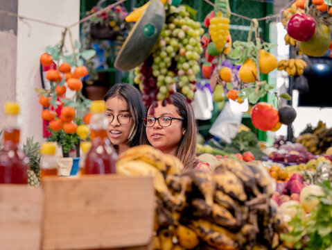 Women Shopping In A Local Market In El Salvador. Hispanic Women.