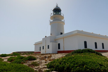 Fototapeta na wymiar Cape de Cavalleria - the northernmost point of the Minorca island. Lighthouse on the Cap de Cavalleria. Minorca (Menorca), Spain 