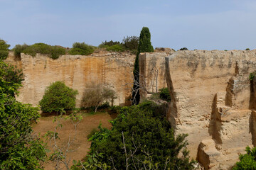 Lithica, Pedreres de s'Hostal, Menorca (Minorca) island, Spain. The sandstone quarries overgrown by trees and vegetation with labirynths and gardens