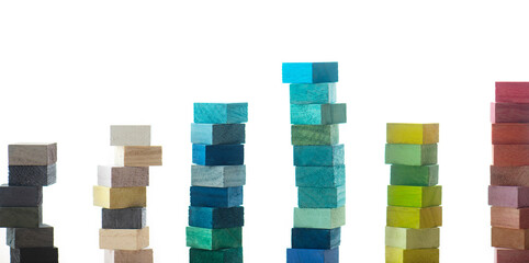Colored wooden block stacked in a bar graph like manner. Isolated on pure white background.