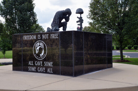A statue atop a veterans memorial in a Chicago suburban community.