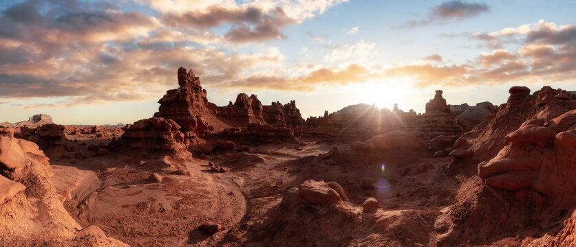 Red Rock Formations in Desert. Colorful Sunny Sunrise Sky Art Render. Spring Season. Goblin Valley State Park. Utah, United States. Nature Background Panorama