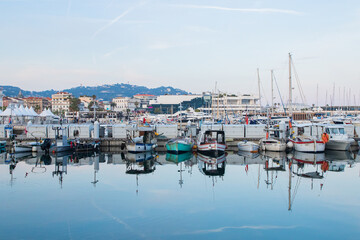 Fototapeta na wymiar European France Italy Boats in Harbour Harbor Reflection Sailing