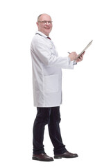 qualified mature doctor with clipboard .isolated on a white background.