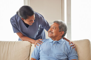 Healthcare, support and nurse working in senior care, bonding with patient showing affection in...
