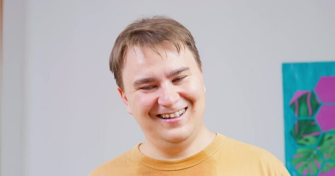 Man good-naturedly scolds, shows forbidding gesture with thumb, shakes head. Accusingly parent, father is amazed at tricks of children, touches, affectionately scolds them. Good boss planning meeting
