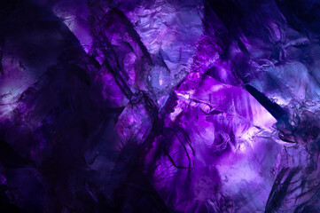 fluorite (also called fluorspar) purple blue macro detail texture background. close-up raw rough unpolished semi-precious gemstone. - obrazy, fototapety, plakaty
