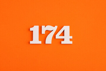 Number 174 - On orange foam rubber background