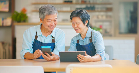 old couple use tablet