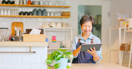 old woman use tablet