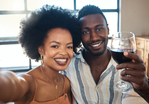 Couple selfie for social media to celebrate with wine glass, champagne and alcohol drinks for happy relationship on date together in a cafe restaurant. Portrait of love, relax and smile black people