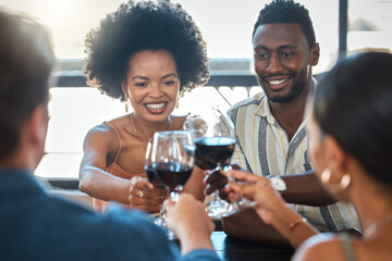 Cheers, celebrating and winning friends drinking wine together at a dinner celebration in a restaurant. Double date of loving and romantic couples dining and having fun on a weekend