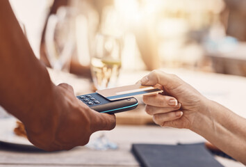 Credit card payment by a retail customer at a store paying using digital money or cash technology on portable machine. Security, safety and hands of sales worker helping woman shopping at a business