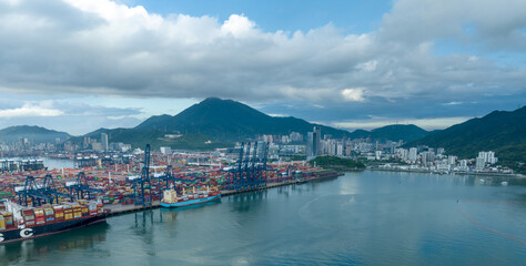 Fototapeta premium Shenzhen ,China - Circa 2022: Aerial view of container ship in Yantian port in Shenzhen city, China