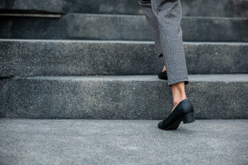 Stepping going up stairs in city, Closeup legs of businesswoman hurry up walking on stairway, rush...