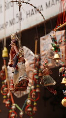 a puppet hanging from a rope