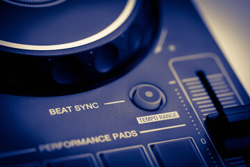 Beat Sync button on a Digital DJ controller  closed up