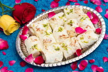 Indian Mithai Bread Malai Roll Rabdi Or Bengali Rabri Is Made Of Soft White Bread Slices, Dipped Soaked Or Dunked In Simmering Creamy Milk With Kesar, Khoya, Mawa, Mava, Khoa, Pista, Badam, Kaju