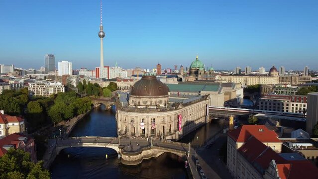 ICE Train on bridge, berlin Cathedral, tv Tower
Amazing aerial view flight panorama overview drone footage
of  Bode Museum island at summer day sunset July 2022 P. Marnitz 4k Cinematic view from above