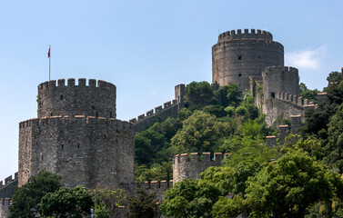 The ruins of Rumeli Hisari (Fortress) built in 1452 and located on the Bosphorus at Istanbul in Turkey. Watch towers and the curtain walls can be seen.