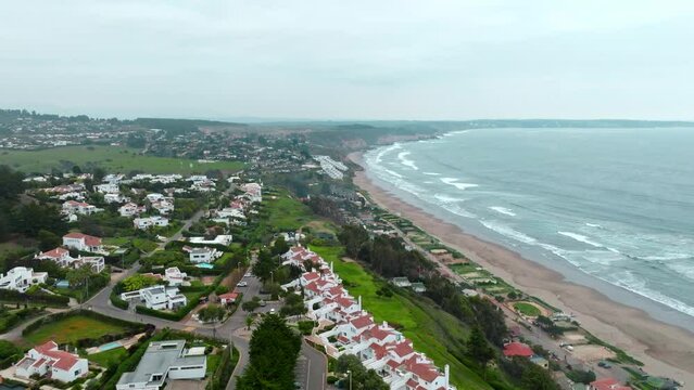 Aerial panoramic view Maitencillo beach exclusive beachside neighborhood day 
