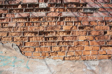 old bricks wall with cracked cement Horizontal background