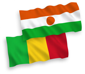 National vector fabric wave flags of Republic of the Niger and Mali isolated on white background. 1 to 2 proportion.
