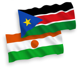 Obraz premium National vector fabric wave flags of Republic of the Niger and Republic of South Sudan isolated on white background. 1 to 2 proportion.