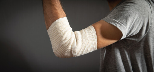 Bandage on elbow. First aid and medicine concept