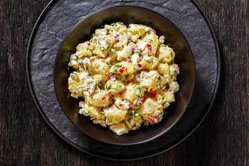 shout hallelujah potato salad in black bowl